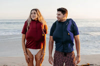 A couple with adult anti-drowning t-shirt, inflated